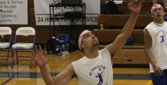 picture of male serving volleyball